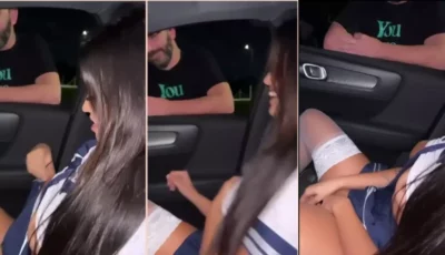 Karlyane Menezes exibindo a marquinha dentro do carro