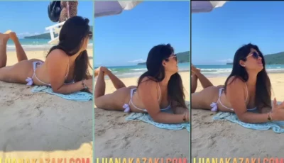Luana Kazaki na praia gravando tudo com seu biquíni bem cavado