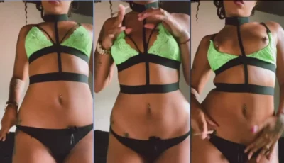 Lívia Vitória, a brasileira, dando uma voltinha com o cigarro no pole dance