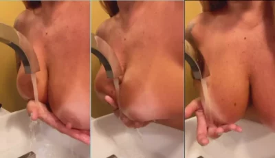 Sabrina di Martini dando um trato nas partes na pia