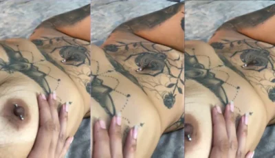 Tatiane Oliveira dando uma provocadinha com os peitões à mostra